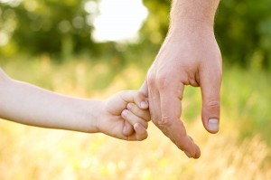 08_bigstock-trust-family-hands-of-child-so-27258686